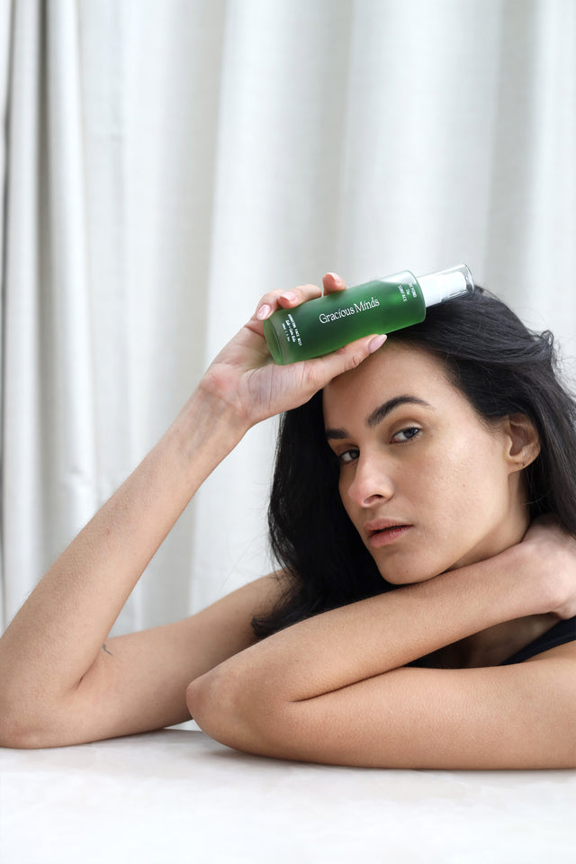 The Gracious Minds Beyond the Surface Hydrating Face Mist/Toner is a hybrid serum mist designed to instantly hydrate and soothe the skin’s barrier on the face and neck, while enhancing the underlying skin elasticity.
Infused with potent green superfoods like Wheatgrass, Japanese Knotweed (Resveratrol), and Gotu Kola, it nourishes the skin, while Pea Peptides work to boost hydration and provide skin protection.